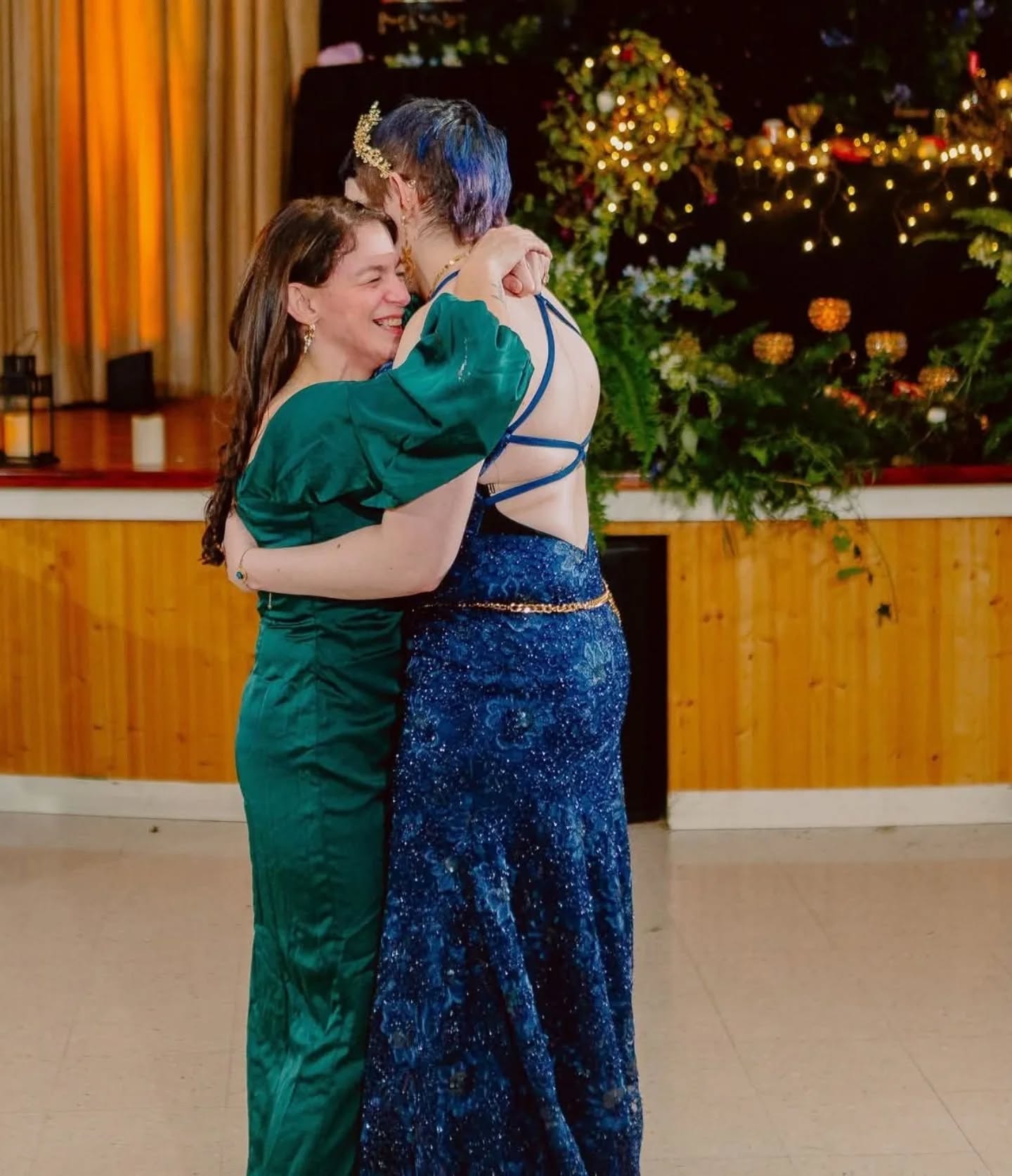 Yes, that sobbing lady in green is me.
I didn't even have time to put makeup on ... Not that it would have mattered because I would have just cried it all off.
My whole face did me wrong. Who cries like that?!?
No matter what, just know you don't look like THIS when you're crying on the wedding day.
Also, that's my awesome kid on their wedding day. Don't they look amazing???