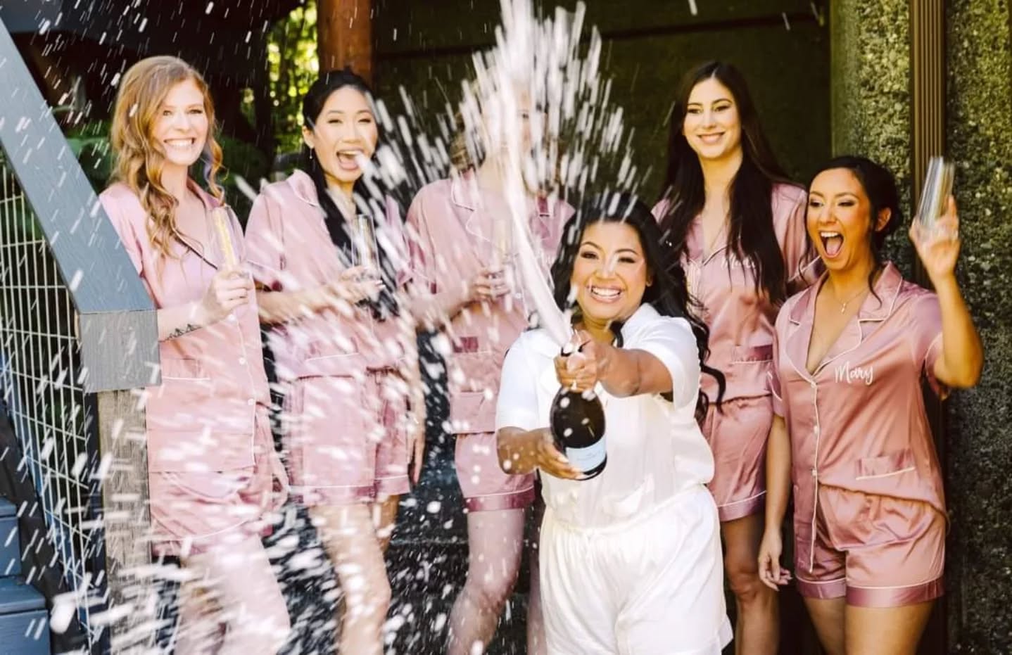 The right way to do the champagne celebration ends with the photographer smelling like champagne all day.